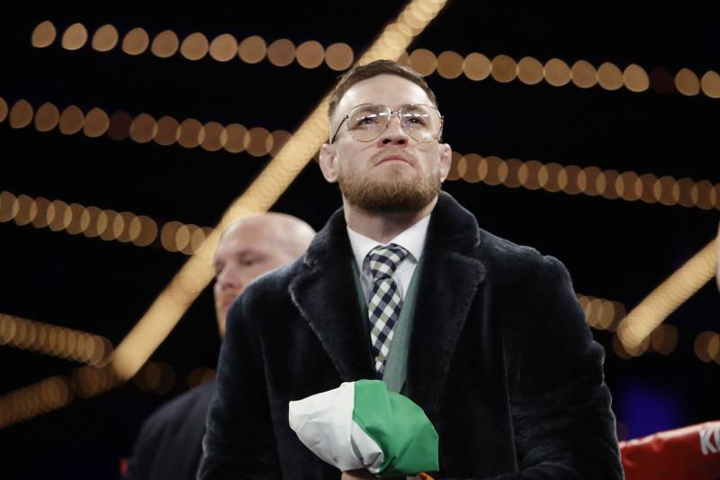 Conor McGregor, of Ireland, stands in the ring before a super bantamweight boxing match between Michael Conlan, of Ireland, and Tim Ibarra on Friday, March 17, 2017, in New York. Conlan stopped Ibarra in the third round. (AP Photo/Frank Franklin II)