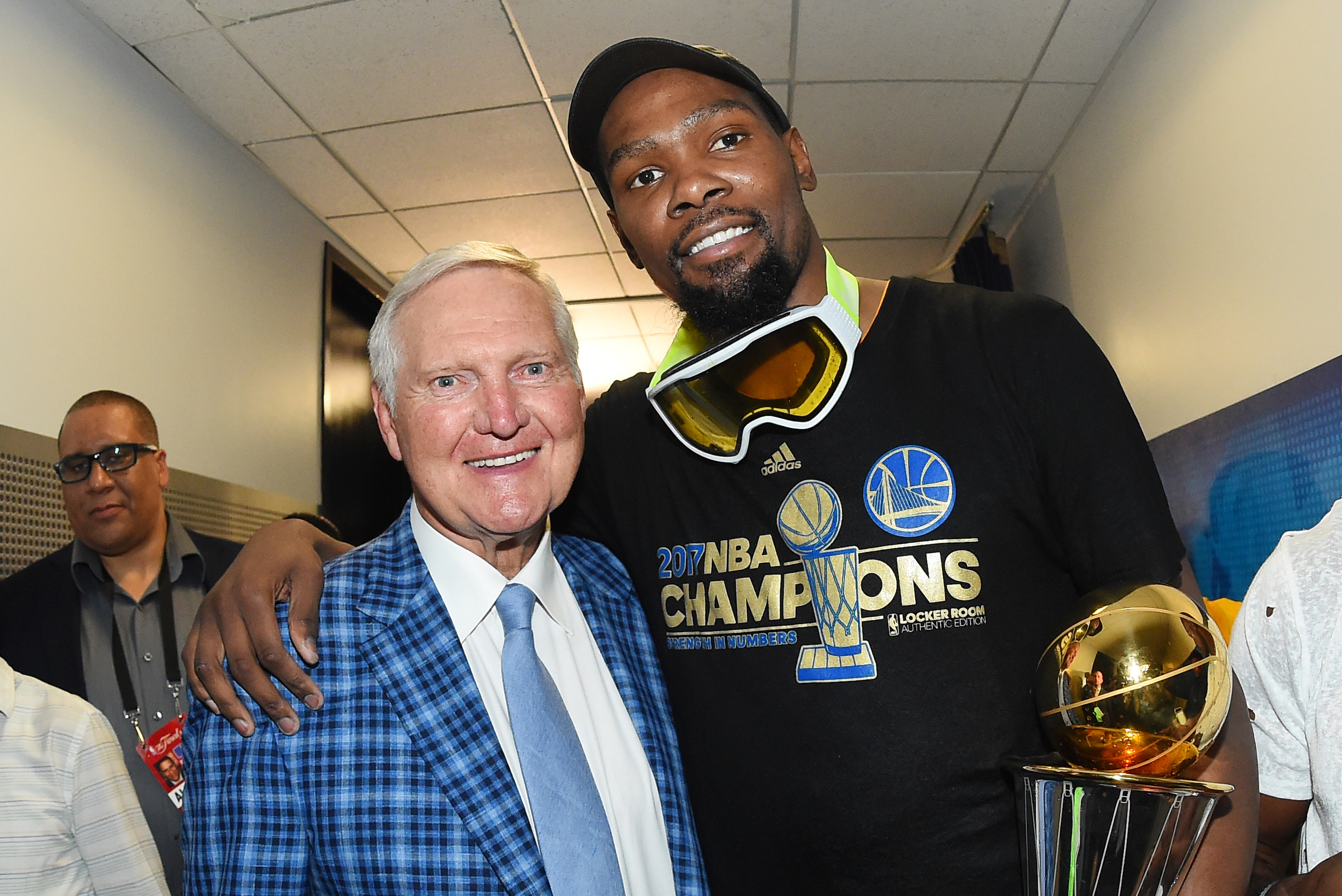 OAKLAND, CA - JUNE 12: NBA Finals MVP Kevin Durant #35 of the Golden State Warriors poses for a photo with NBA legend Jerry West after winning the NBA Championship in Game Five of the 2017 NBA Finals against the Cleveland Cavaliers on June 12, 2017 at ORACLE Arena in Oakland, California. NOTE TO USER: User expressly acknowledges and agrees that, by downloading and/or using this photograph, user is consenting to the terms and conditions of Getty Images License Agreement. Mandatory Copyright Notice: Copyright 2017 NBAE (Photo by Andrew D. Bernstein/NBAE via Getty Images)