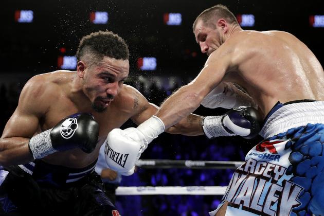 Andre Ward, left, punches Sergey Kovalev, of Russia, during their light heavyweight boxing match, Saturday, Nov. 19, 2016, in Las Vegas. (AP Photo/John Locher)