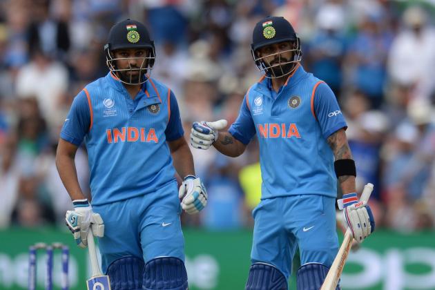 BIRMINGHAM, ENGLAND - JUNE 15 : Rohit Sharma and Virat Kohli of India during the ICC Champions Trophy match between Bangladesh and India at Edgbaston cricket ground on June 15, 2017 in Birmingham, England. (Photo by Philip Brown/Getty Images)