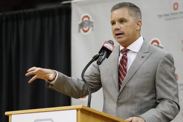 FILE - In this Monday, June 12, 2017, file photo, Chris Holtmann answers questions during a NCAA college basketball news conference introducing him the new men's head basketball coach at Ohio State in Columbus, Ohio. Holtmann's $3 million annual contract includes incentives for making the NCAA Tournament and ensuring his players get good grades. The contract still has to be approved by university trustees, but Ohio State released the terms Wednesday, June 14, 2017.  (AP Photo/Jay LaPrete, File)