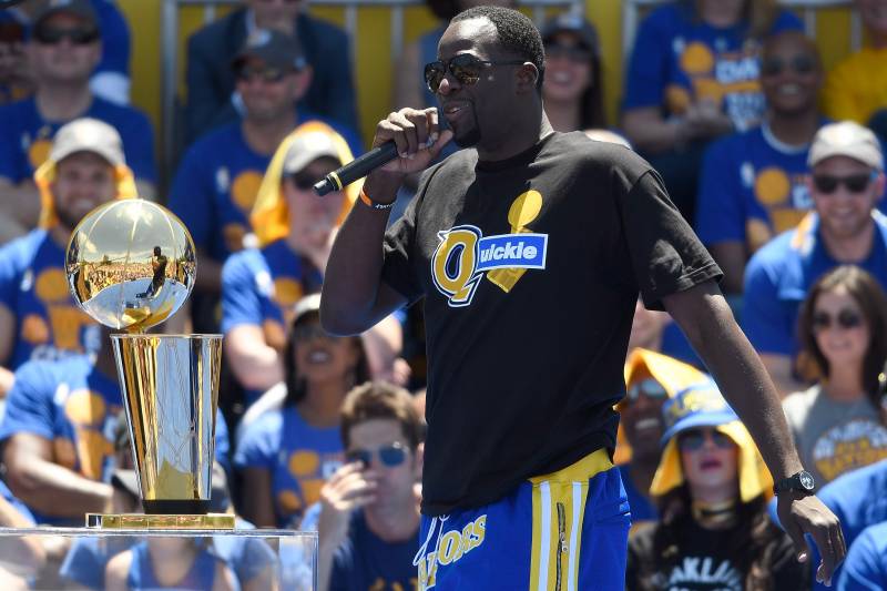 OAKLAND, CA - JUNE 15:  Draymond Green #23 of the Golden State Warriors talks to the fans while they celebrate the Warriors 2017 NBA Championship at The Henry J. Kaiser Convention Center during thier Victory Parade and Rally on June 15, 2017 in Oakland, California.  (Photo by Thearon W. Henderson/Getty Images)