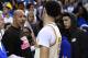 FILE - In this March 4, 2017, file photo, UCLA guard Lonzo Ball, right, shakes hands with his father LaVar following an NCAA college basketball game against Washington State in Los Angeles. The outspoken father of former UCLA star Lonzo Ball said Wednesday, May 17, on Fox Sport 1's