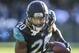 CORRECTS SECOND REFERENCE - In this Saturday, Dec. 24, 2016, photo, Jacksonville Jaguars cornerback Jalen Ramsey returns an interception for a touchdown against the Tennessee Titans during the second half of an NFL football game in Jacksonville, Fla. Ramsey had one thought as he scampered toward his first NFL touchdown: Deion Sanders. (AP Photo/Gary McCullough)