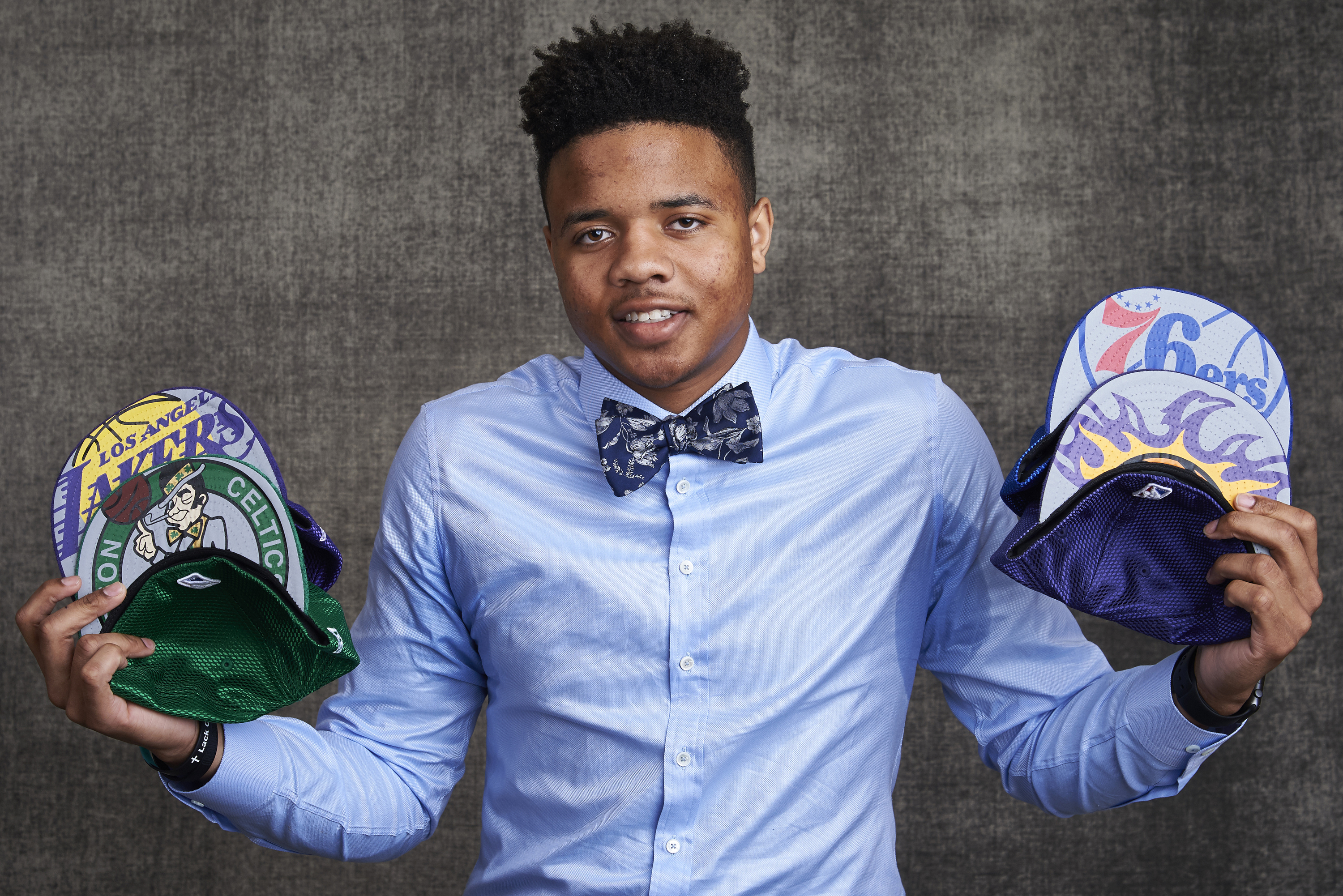 NEW YORK, NEW YORK - MAY 16: Draft prospect Markelle Fultz poses poses with draft caps for portraits prior to the 2017 NBA Draft Lottery at the NBA Headquarters in New York, New York. NOTE TO USER: User expressly acknowledges and agrees that, by downloading and or using this Photograph, user is consenting to the terms and conditions of the Getty Images License Agreement. Mandatory Copyright Notice: Copyright 2017 NBAE (Photo by Jennifer Pottheiser/NBAE via Getty Images)