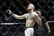 Nov 12, 2016; New York, NY, USA; Conor McGregor (blue gloves) before fighting Eddie Alvarez (red gloves) in their lightweight title bout during UFC 205 at Madison Square Garden. Mandatory Credit: Adam Hunger-USA TODAY Sports