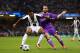 CARDIFF, WALES - JUNE 03: Alex Sandro of Juventus in action with Dani Carvajal of Real Madrid during the UEFA Champions League Final match between Juventus and Real Madrid at the National Stadium of Wales on June 3, 2017 in Cardiff, Wales. (Photo by Chris Brunskill Ltd/Getty Images)