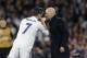 Real Madrid's Cristiano Ronaldo talks with Real Madrid's head coach Zinedine Zidane during the Champions League round of 16, first leg, soccer match between Real Madrid and Napoli at the Santiago Bernabeu stadium in Madrid, Wednesday Feb. 15, 2017. (AP Photo/Francisco Seco)