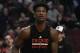 Chicago Bulls forward Jimmy Butler (21) warms up before the start of the game against the Miami Heat during an NBA basketball game in Chicago, Friday, Jan. 27, 2017. Butler was taken out of the starting lineup for comments he made after a loss, (AP Photo/David Banks)
