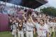 Florida State's Mike Compton (17), Bryant Holzmann (33), Danny De La Calle second from left, and Quincy Nieporte (29) lead their team to tip their caps to their fans after defeating College of Charleston 8-1 in the Tallahassee Regional of the NCAA college baseball tournament in Tallahassee, Fla., Monday, June 1, 2015. Florida State defeated Charleston 8-1. (AP Photo/Mark Wallheiser)