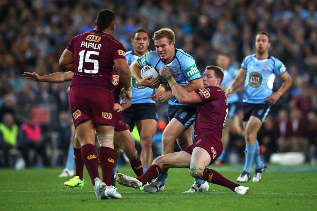 SYDNEY, AUSTRALIA - JUNE 21:  Jake Trbojevic of the Blues is tackled during game two of the State Of Origin series between the New South Wales Blues and the Queensland Maroons at ANZ Stadium on June 21, 2017 in Sydney, Australia.  (Photo by Cameron Spencer/Getty Images)