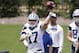 Dallas Cowboys quarterback Kellen Moore throws a pass during an NFL football practice at the team's training facility, Tuesday, June 13, 2017, in Frisco, Texas. (AP Photo/Tony Gutierrez)