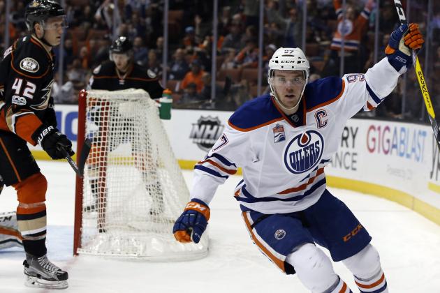 Edmonton Oilers center Connor McDavid, right, reacts after scoring against Anaheim Ducks defenseman Josh Manson, left, during the first period of an NHL hockey game in Anaheim, Calif., Wednesday, March 22, 2017. (AP Photo/Alex Gallardo)