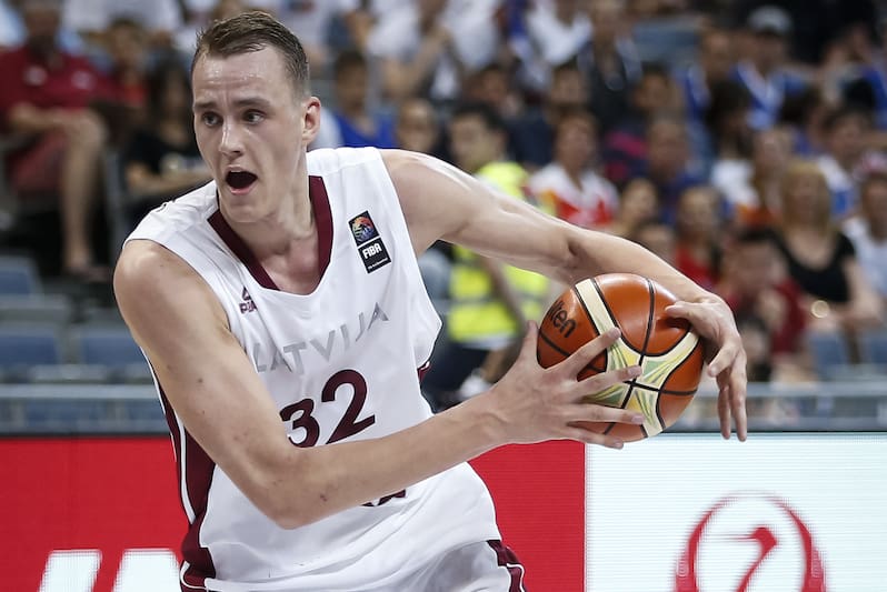 BELGRADE, SERBIA - JULY 05: Anzejs Pasecniks (R) of Latvia in action against Petr Benda (DOWN) of Czech Republic during the 2016 FIBA World Olympic Qualifying basketball Group B match between Latvia and Czech Republic at Kombank Arena on July 05, 2016 in Belgrade, Serbia. (Photo by Srdjan Stevanovic/Getty Images)