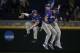 ADDS NAMES - TCU outfielders Josh Watson, left, Nolan Brown, back right and Austen Wade, front right, celebrate following the the team's NCAA College World Series baseball game against Florida in Omaha, Neb., Friday, June 23, 2017. TCU won 9-2. (AP Photo/Nati Harnik)