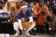 3's Company player/captain and coach Allen Iverson, center, kneels on the sideline during the first half of Game 3 in the BIG3 Basketball League debut, Sunday, June 25, 2017, at the Barclays Center in New York. (AP Photo/Kathy Willens)