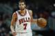 Chicago Bulls guard Michael Carter-Williams directs his team against the Charlotte Hornets during the second half of an NBA basketball game, Monday, Jan. 2, 2017, in Chicago. (AP Photo/Kamil Krzaczynski)