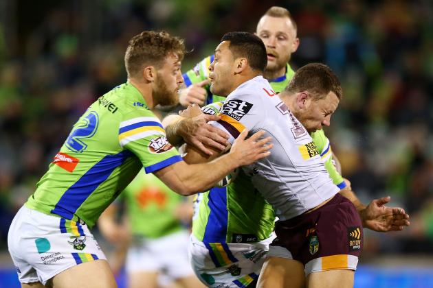 CANBERRA, AUSTRALIA - JUNE 24: Alexander Glenn of the Broncos is tackled during the round 16 NRL match between the Canberra Raiders and the Brisbane Broncos at GIO Stadium on June 24, 2017 in Canberra, Australia.  (Photo by Mark Nolan/Getty Images)