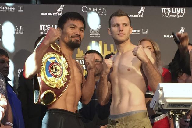 Manny Pacquiao, left, and Jeff Horn pose for a photo after weighing in, Tuesday, July 1, 2017, in Brisbane, Australia. Pacquiao, is putting his WBO welterweight world title on the line Sunday, July 2, against the 29-year-old Horn. (AP Photo/John Pye)