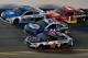 DAYTONA BEACH, FL - JULY 01: Dale Earnhardt Jr., driver of the #88 Nationwide Chevrolet, Chase Elliott, driver of the #24 NAPA Patriotic Chevrolet, Kevin Harvick, driver of the #4 Jimmy John's Ford, and Jamie McMurray, driver of the #1 McDonald's $1 Any Size Soft Drink Chevrolet, race during the Monster Energy NASCAR Cup Series 59th Annual Coke Zero 400 Powered By Coca-Cola at Daytona International Speedway on July 1, 2017 in Daytona Beach, Florida. (Photo by Matt Sullivan/Getty Images)