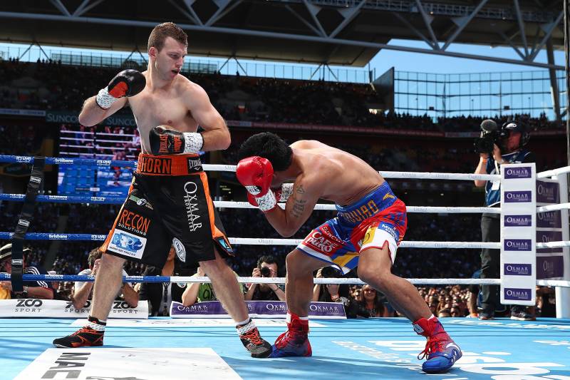 BRISBANE, AUSTRALIA - JULY 02: Jeff Horn of Australia and Manny Pacquiao exchange punches during the WBO World Welterweight Title Fight at Suncorp Stadium on July 2, 2017 in Brisbane, Australia. (Photo by Chris Hyde/Getty Images)