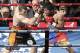 Jeff Horn, left, of Australia and Manny Pacquiao of the Philippines fight during their WBO World welterweight title bout in Brisbane, Australia, Sunday, July 2, 2017. Pacquiao lost his WBO welterweight world title to Horn in a stunning, unanimous points decision in the Sunday afternoon bout billed as the Battle of Brisbane in front of more than 50,000 people. (AP Photo/Tertius Pickard)