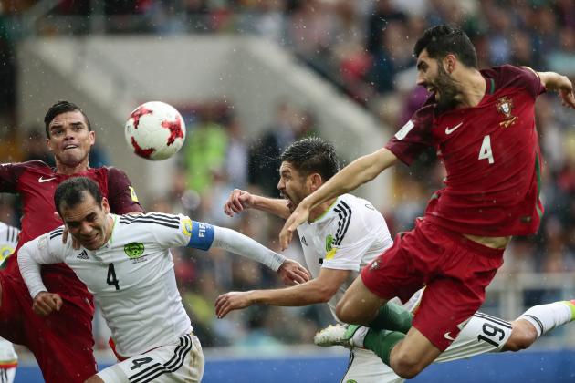 From right, Portugal's Luis Neto, Mexico's Oribe Peralta, Mexico's Rafael Marquez and Portugal's Pepe go for the ball during the Confederations Cup, third place soccer match between Portugal and Mexico, at the Moscow Spartak Stadium, Sunday, July 2, 2017. (AP Photo/Denis Tyrin)