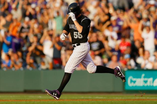 DENVER, CO - JULY 5:  Jon Gray #55 of the Colorado Rockies tips his cap while trotting around the bases after hitting a 467-foot home run during the second inning against the Cincinnati Reds at Coors Field on July 5, 2017 in Denver, Colorado. The home run was the first of his career and the longest by a Rockies player this season. (Photo by Justin Edmonds/Getty Images)