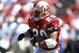 SAN FRANCISCO, CA - SEPTEMBER 1: Derek Loville #20 of the San Francisco 49ers carries the ball against the New Orleans Saints during an NFL football game September 1, 1996 at Candlestick Park in San Francisco, California. Loville played for the 49ers from 1993-96. (Photo by Focus on Sport/Getty Images)
