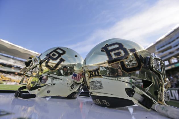 FILE - In this Dec. 5, 2015, file photo, Baylor helmets on shown the field after an NCAA college football game in Waco, Texas. Baylor University will look to rebuild its reputation and perhaps its football program after an outside review found administrators mishandled allegations of sexual assault and the team operated under the perception it was above the rules. (AP Photo/LM Otero, File)