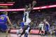 Orlando Magic forward Jeff Green (34) goes up for a shot between New York Knicks forward Mindaugas Kuzminskas (91), forward Kristaps Porzingis, center, and guard Ron Baker (31), right, during the first half of an NBA basketball game in Orlando, Fla., Monday, March 6, 2017. (AP Photo/Phelan M. Ebenhack)