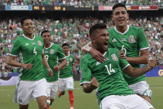 Hedgardo Marin, 14, is congratulated by his teammate Edson Alvarez after he scored against El Salvador during a CONCACAF Gold Cup soccer match in San Diego, Sunday, July 9, 2017. (AP Photo/Gregory Bull)
