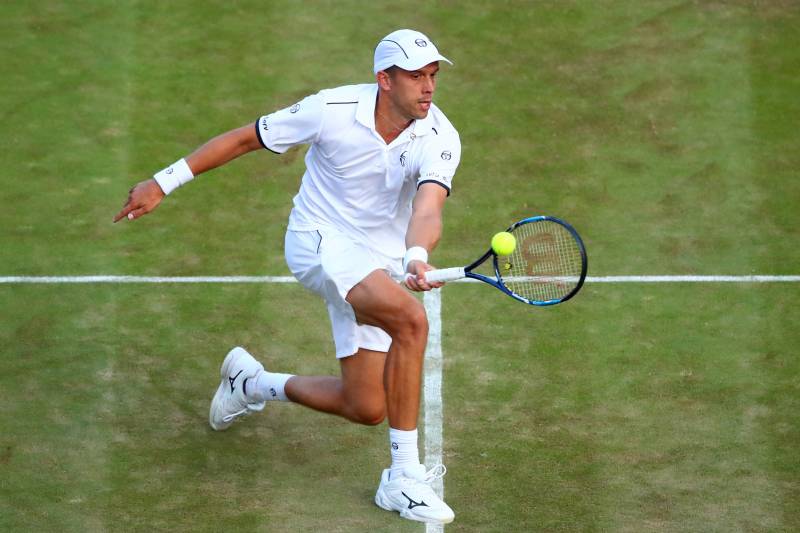 LONDON, ENGLAND - JULY 10:  Gilles Muller of Luxembourg plays a forehand during the Gentlemen's Singles fourth round match against Rafael Nadal of Spain on day seven of the Wimbledon Lawn Tennis Championships at the All England Lawn Tennis and Croquet Club on July 10, 2017 in London, England.  (Photo by Clive Brunskill/Getty Images)