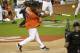 National League's Livian Hernandez hits a grand slam during the the All-Star Celebrity Softball game, Sunday, July 9, 2017, in Miami. (AP Photo/Lynne Sladky)