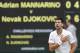Serbia's Novak Djokovic gestures to the crowd after beating France's Adrian Mannarino during their men's singles fourth round match on the eighth day of the 2017 Wimbledon Championships at The All England Lawn Tennis Club in Wimbledon, southwest London, on July 11, 2017.
Djokovic won the match 6-2, 7-6, 6-4. / AFP PHOTO / Adrian DENNIS / RESTRICTED TO EDITORIAL USE (Photo credit should read ADRIAN DENNIS/AFP/Getty Images)