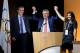 (LtoR) Mayor of Paris Anne Hidalgo, International Olympic Committee (IOC) President German Thomas Bach and Los Angeles Mayor Eric Garcetti reacts on the podium during an International Olympic Committee (IOC) extraordinary session on July 11, 2017 in Lausanne.
The International Olympic Committee on July 11 agreed to award the 2024 and 2028 Games at the same time, effectively guaranteeing that Paris and Los Angeles will be the hosts. The decision was made by consensus at a meeting of IOC members in Lausanne, Switzerland, after a strong lobbying effort by IOC boss who wanted both cities, which had been rivals for 2024, to get the Games. / AFP PHOTO / Fabrice COFFRINI (Photo credit should read FABRICE COFFRINI/AFP/Getty Images)