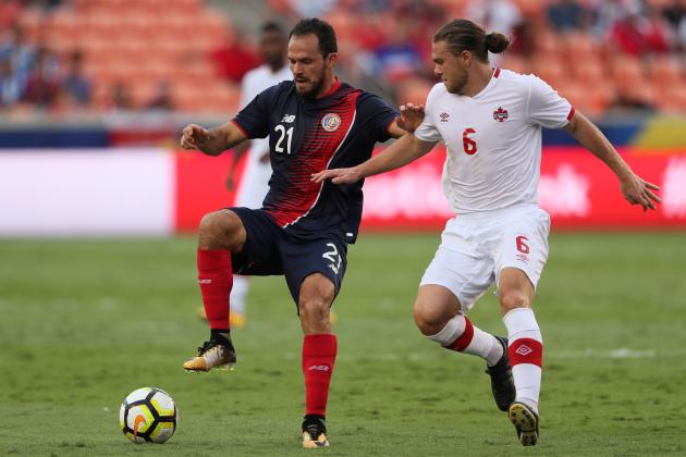 HOUSTON , TX - JULY 11:  Marcos Urena of Costa Rica competes with Samuel Piette of Canada during the 2017 CONCACAF Gold Cup Group A match between Costa Rica and Canada at BBVA Compass Stadium on July 11, 2017 in Houston, Texas.  (Photo by Matthew Ashton - AMA/Getty Images)