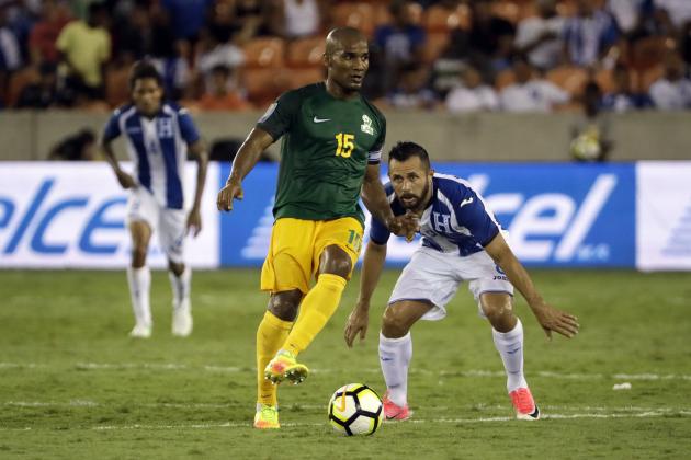 French Guiana midfielder Florent Malouda (15) controls the ball in front of Honduras midfielder Alfredo Mejia (8) in the first half of a CONCACAF Gold Cup soccer match in Houston, Tuesday, July 11, 2017. (AP Photo/David J. Phillip)