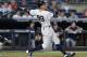FILE - In this July 7, 2017, file photo, New York Yankees' Aaron Judge watches his fifth-inning solo home run in the team's baseball game against the Milwaukee Brewers, in New York. This time last year, Aaron Judge had played exactly zero big-league games. The New York Yankees' rookie slugger is now an All-Star and MVP hopeful. Big things are happening for one of baseball's biggest men. (AP Photo/Kathy Willens, File)