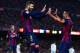 BARCELONA, SPAIN - DECEMBER 20: Gerard Pique of FC Barcelona celebrates with his teammate Xavi Hernandez of FC Barcelona after scoring his team's third goal during the La Liga match between FC Barcelona and Cordoba CF at Camp Nou on December 20, 2014 in Barcelona, Spain. (Photo by David Ramos/Getty Images)