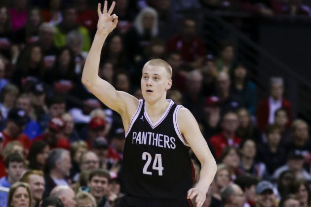CORRECTS TO DIVISION 1, INSTEAD OF DIVISION 2 - Stevens Point's Joey Hauser signals after hitting a 3-point basket against Muskego during the first half of the Division 1 final at the WIAA boys' state basketball championships Saturday, March 19, 2016, in Madison, Wis. (AP Photo/Andy Manis)