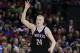CORRECTS TO DIVISION 1, INSTEAD OF DIVISION 2 - Stevens Point's Joey Hauser signals after hitting a 3-point basket against Muskego during the first half of the Division 1 final at the WIAA boys' state basketball championships Saturday, March 19, 2016, in Madison, Wis. (AP Photo/Andy Manis)