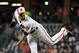 Baltimore Orioles reliever Zach Britton follows through on a pitch to the Toronto Blue Jays during the ninth inning of a baseball game in Baltimore, Wednesday, April 5, 2017. Baltimore won 3-1. (AP Photo/Patrick Semansky)