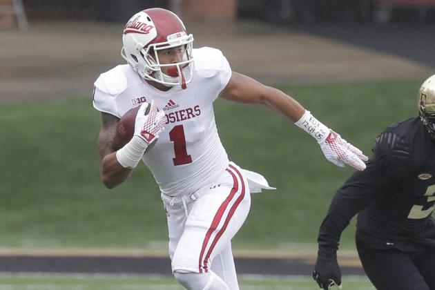 Indiana's Simmie Cobbs Jr. (1) runs past Wake Forest's Davin Gaulden (3) defends during the first half of an NCAA college football game in Winston-Salem, N.C., Saturday, Sept. 26, 2015 . (AP Photo/Chuck Burton)