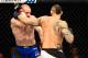 GLASGOW, SCOTLAND - JULY 16: (R-L) Santiago Ponzinibbio of Argentina punches Gunnar Nelson of Iceland in their welterweight bout during the UFC Fight Night event at the SSE Hydro Arena Glasgow on July 16, 2017 in Glasgow, Scotland. (Photo by Josh Hedges/Zuffa LLC/Zuffa LLC via Getty Images)