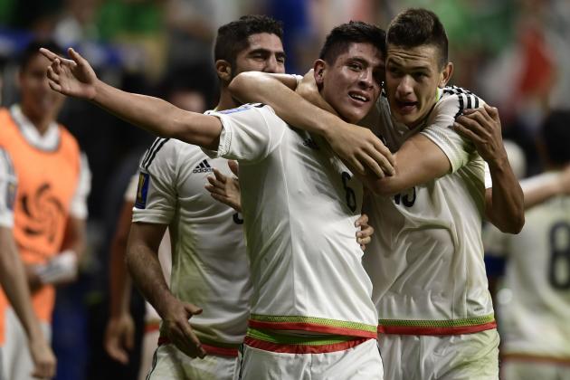 Edson Alvarez (L) of Mexico celebrates with teammate Cesar Montes (R) after scoring the second goal against Curacao in their CONCACAF Gold cup soccer match at the Alamodome on July 16, 2017 in San Antonio, Texas. 
 / AFP PHOTO / Brendan Smialowski        (Photo credit should read BRENDAN SMIALOWSKI/AFP/Getty Images)