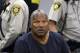FILE - In this May 14, 2013 pool file photo, O.J. Simpson sits during a break on the second day of an evidentiary hearing in Clark County District Court in Las Vegas. Simpson, the former football star, TV pitchman and now Nevada prison inmate, will have a lot going for him when he appears before state parole board members Thursday, July 20, 2017 seeking his release after more than eight years for an ill-fated bid to retrieve sports memorabilia. (AP Photo/Ethan Miller, Pool, File)