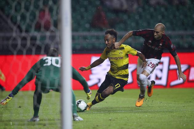GUANGZHOU, CHINA - JULY 18:  Pierre-Emerick Aubameyang of Borussia Dortmund competes for the ball with  Gabriel Paletta and Marco Storari of AC Milan during the 2017 International Champions Cup football match between AC milan and Borussia Dortmund at University Town Sports Centre Stadium on July 18, 2017 in Guangzhou, China.  (Photo by Lintao Zhang/Getty Images)