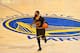 OAKLAND, CA - JUNE 12: Kyrie Irving #2 of the Cleveland Cavaliers dribbles the ball up court against the Golden State Warriors in Game Five of the 2017 NBA Finals on June 12, 2017 at Oracle Arena in Oakland, California. NOTE TO USER: User expressly acknowledges and agrees that, by downloading and or using this photograph, user is consenting to the terms and conditions of Getty Images License Agreement. Mandatory Copyright Notice: Copyright 2017 NBAE (Photo by Jesse D. Garrabrant/NBAE via Getty Images)