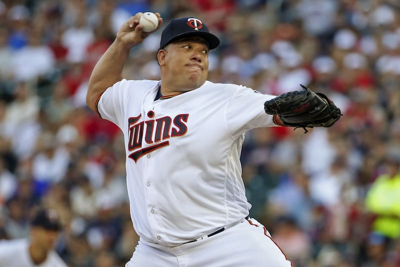 Minnesota Twins starting pitcher Bartolo Colon throws to the New York Yankees in the first inning of a baseball game Tuesday, July 18, 2017, in Minneapolis. (AP Photo/Bruce Kluckhohn)
